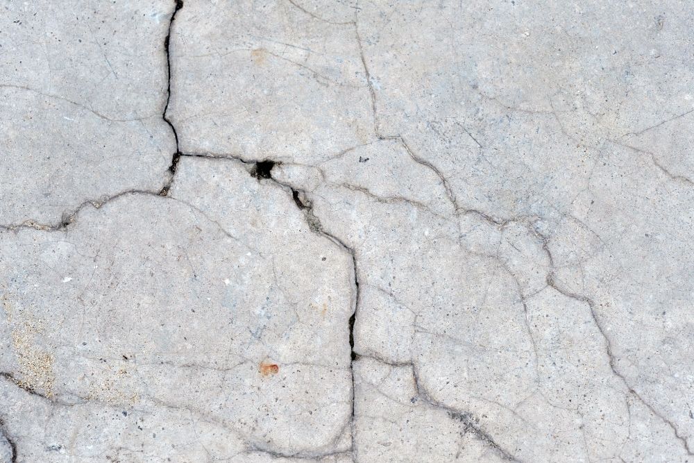 cement floor with a lot of cracks