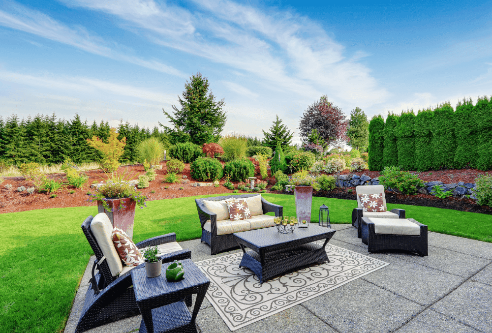 patio landscaping with cozy chairs