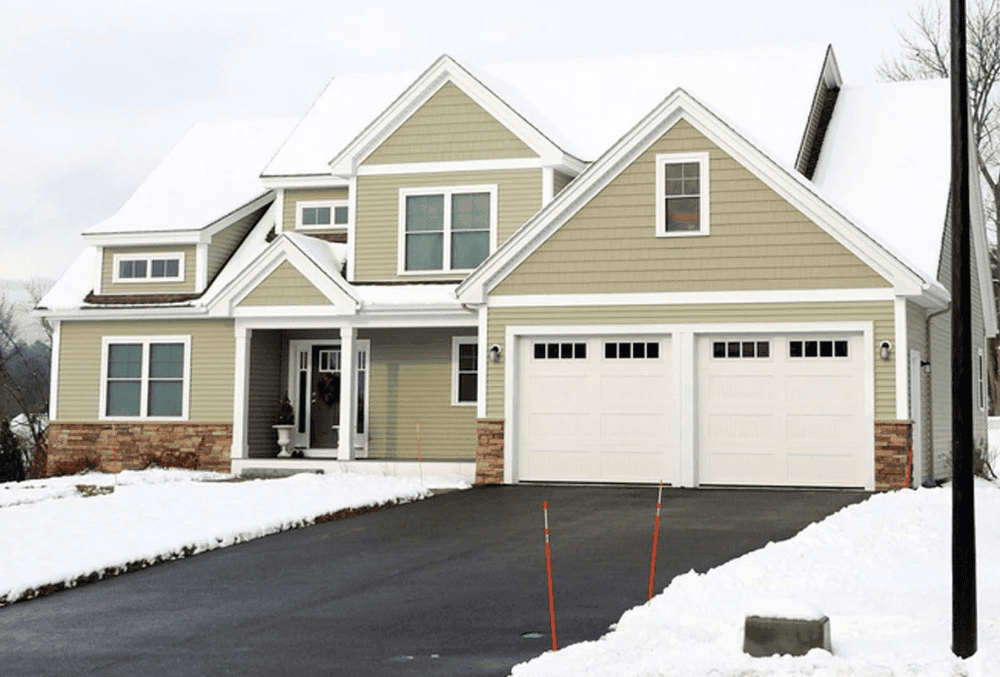two-storey house with a heated driveway