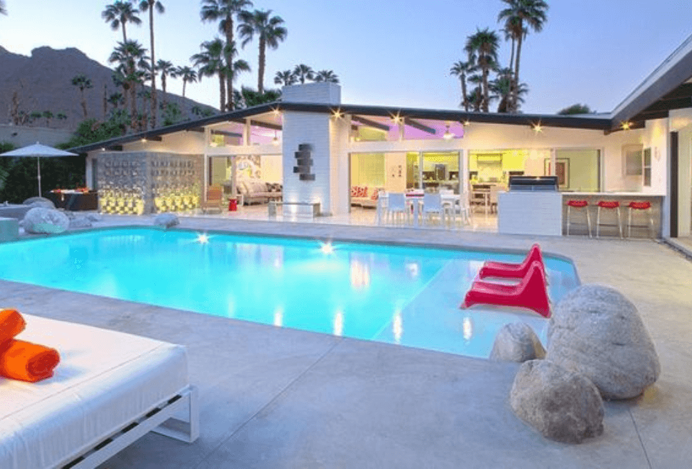 well-lit concrete pool deck in residential house