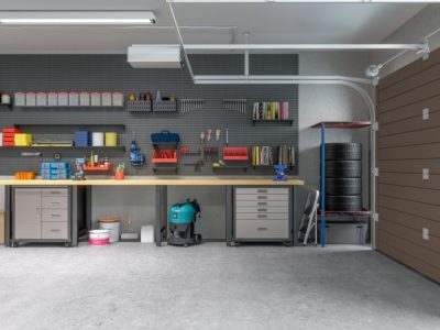 Modern garage with durable concrete coating for a clean, polished, and long-lasting floor finish.”