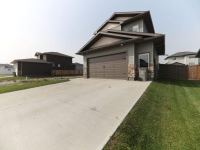 house with a concrete driveway