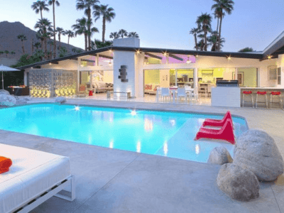 well-lit concrete pool deck in residential house