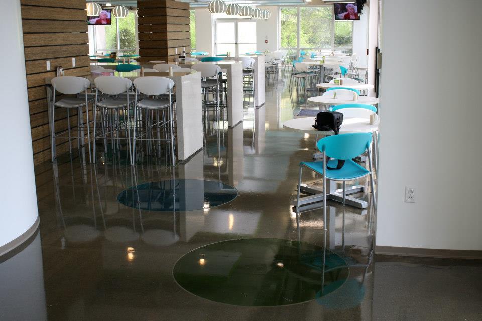 staining concrete floor in open restaurant