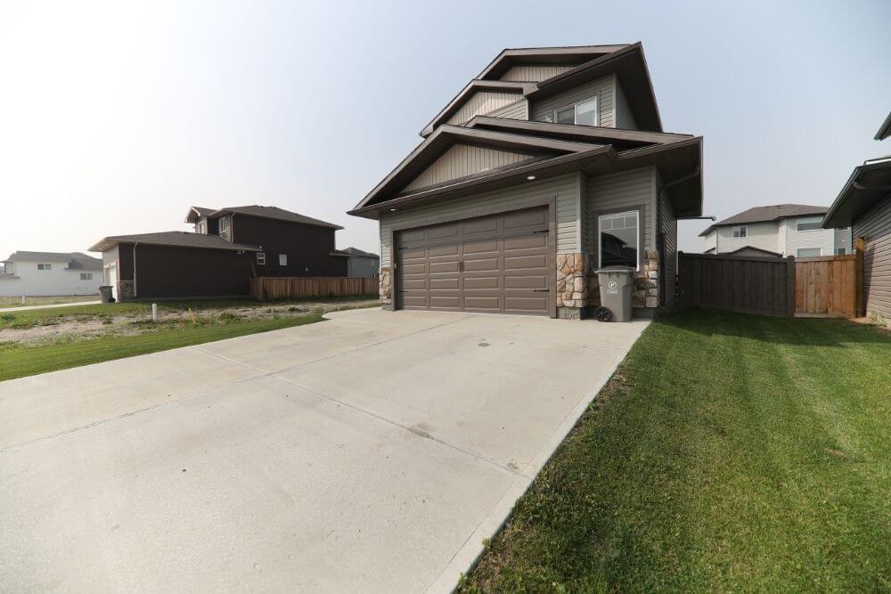 house with a concrete driveway