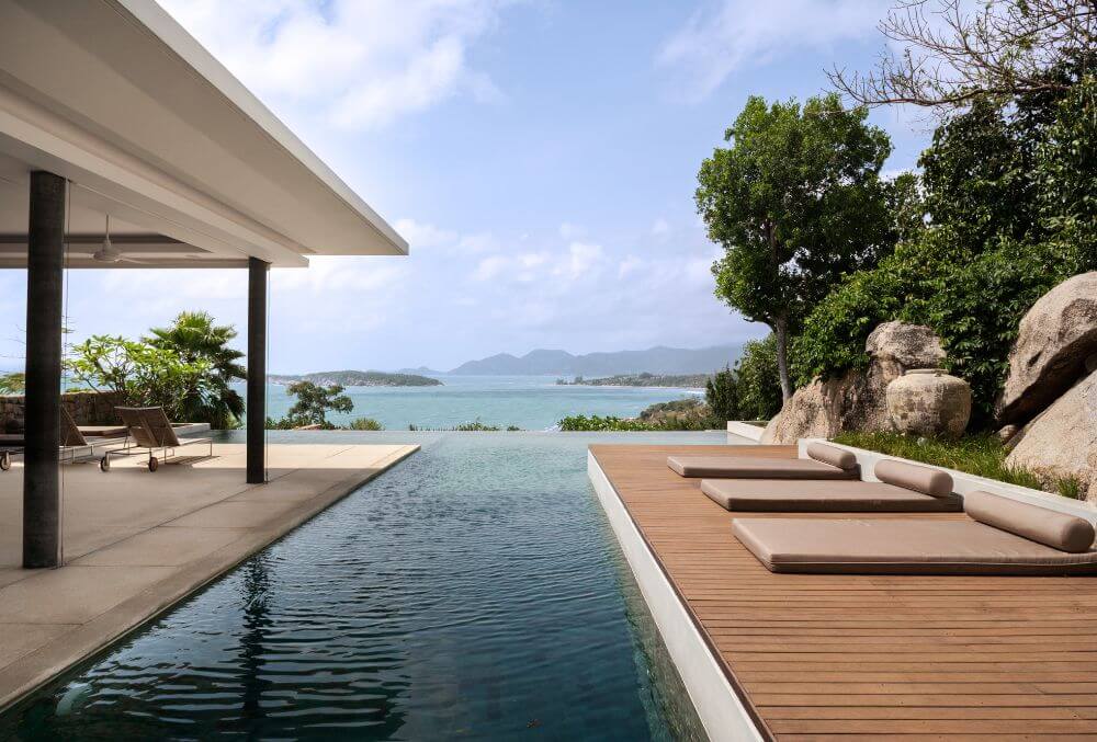 infinity pool and a hardwood deck