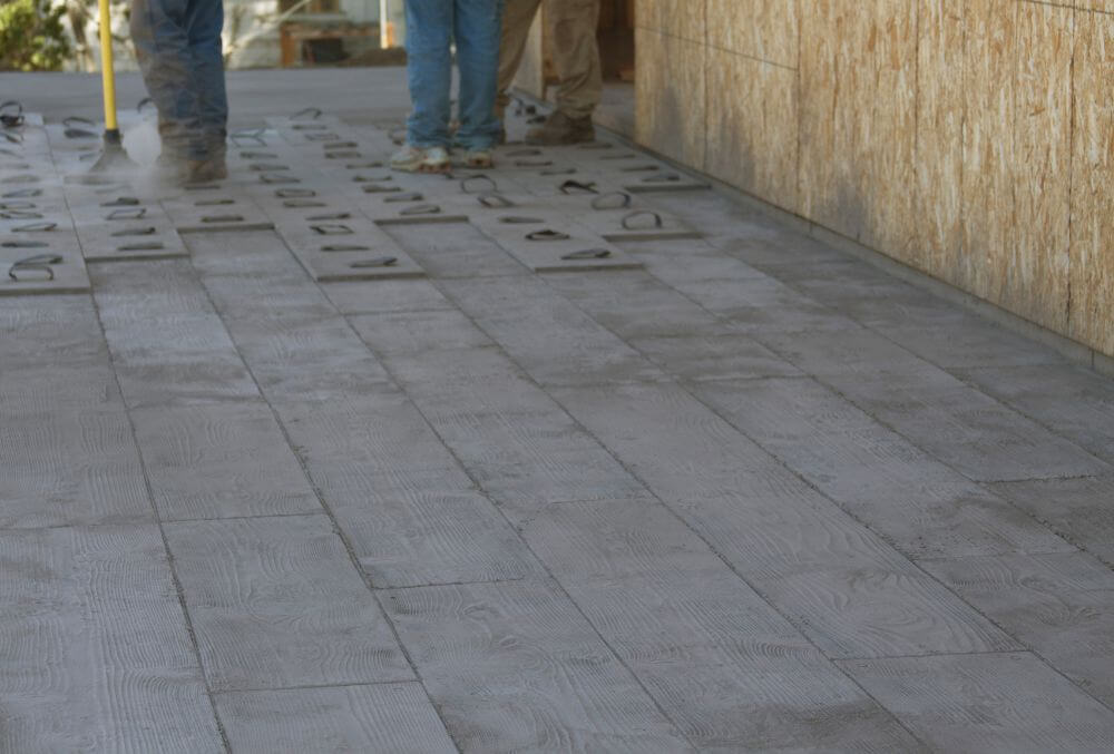 contractors stamping the concrete floors