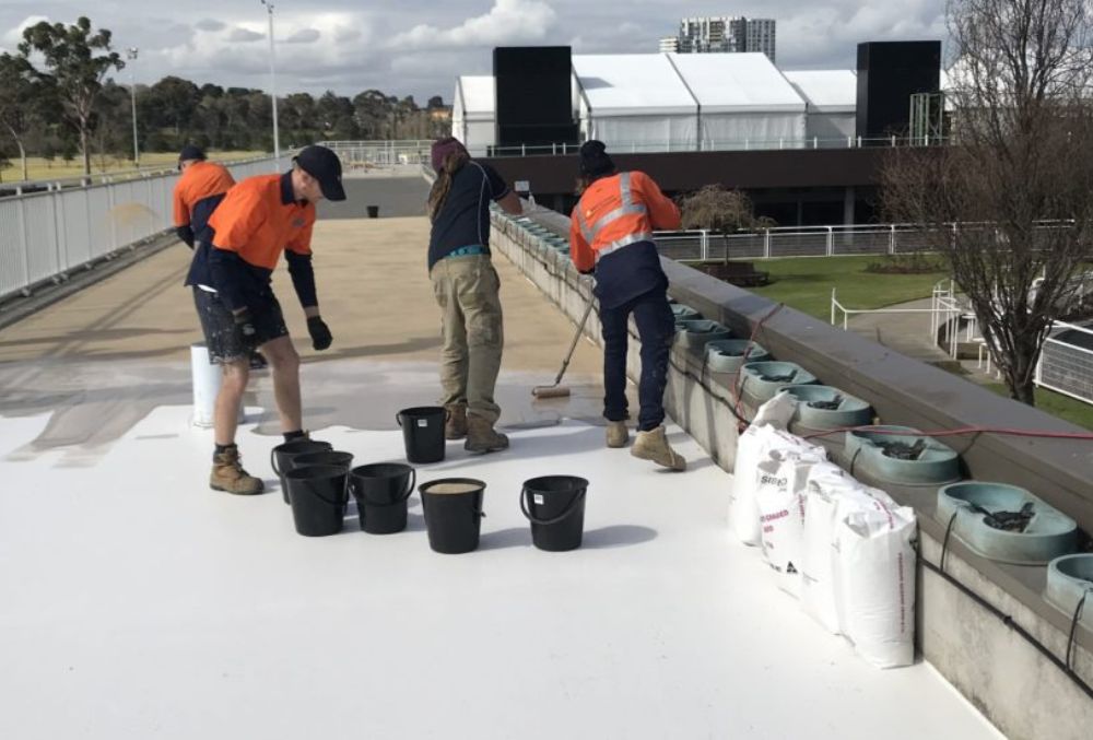 Traffic membrane system applied on a concrete parking deck, providing a durable, waterproof, and slip-resistant surface for long-lasting protection.