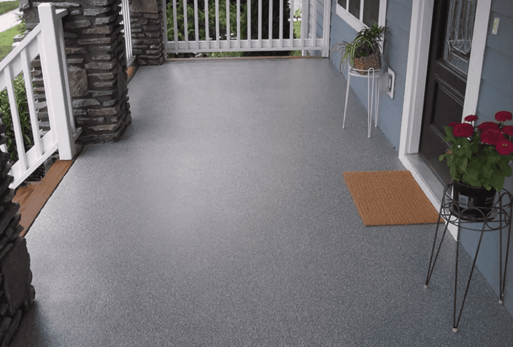 Outdoor patio with concrete floor coating for a durable and stylish finish.